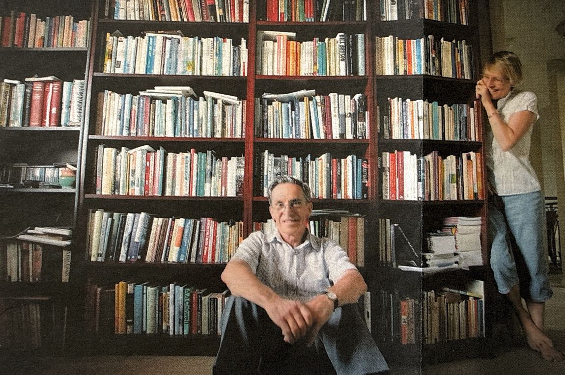 Paul Kraus at home, surrounded by his library